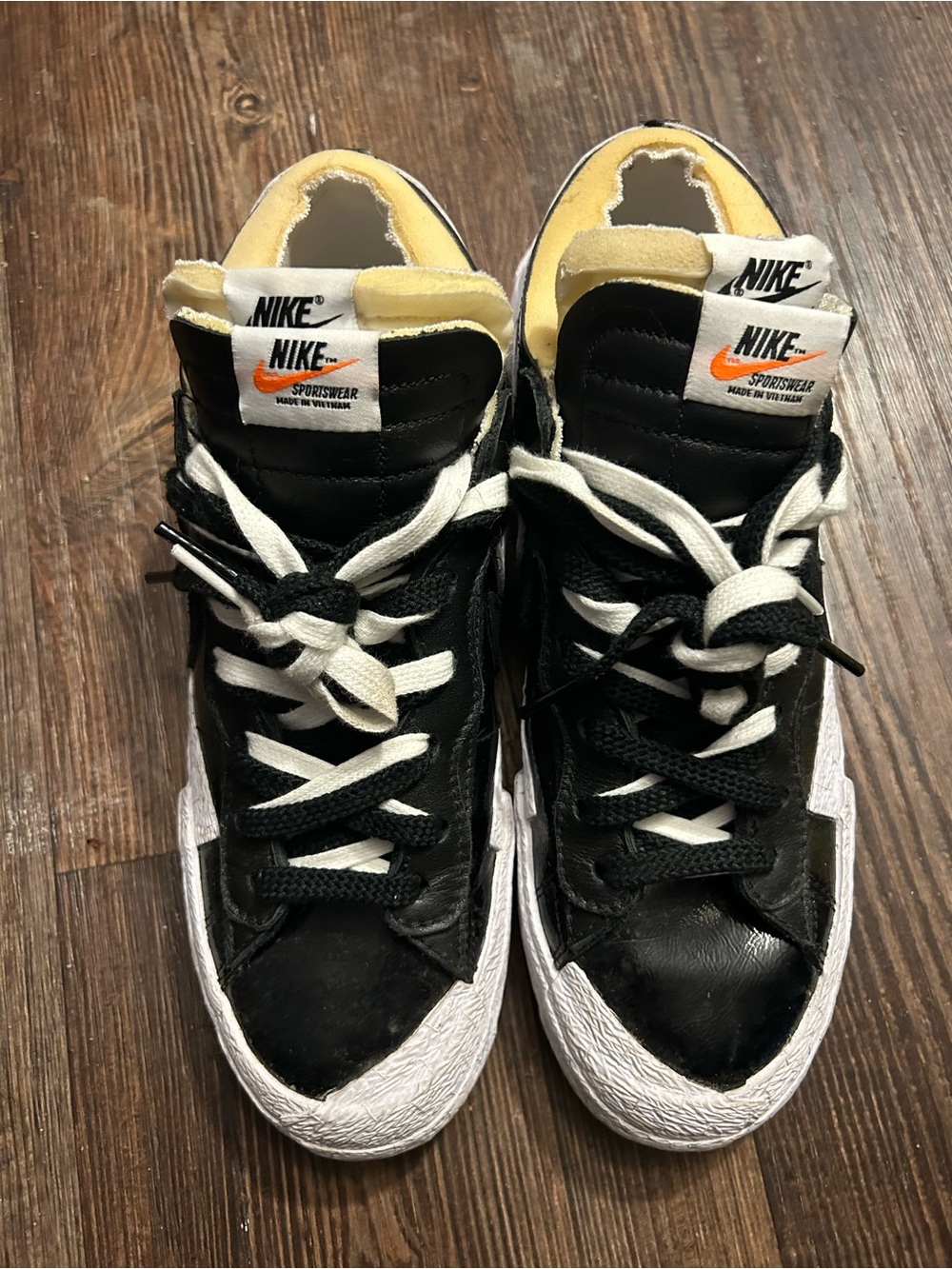 Nike Black and White High-Top Sneakers with Yellow Tongue Accent